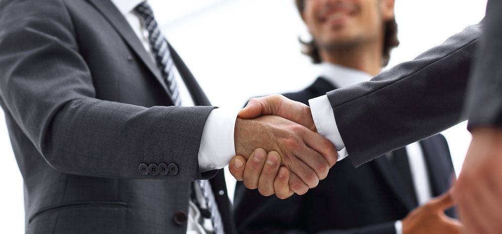 Two businessmen shaking hands